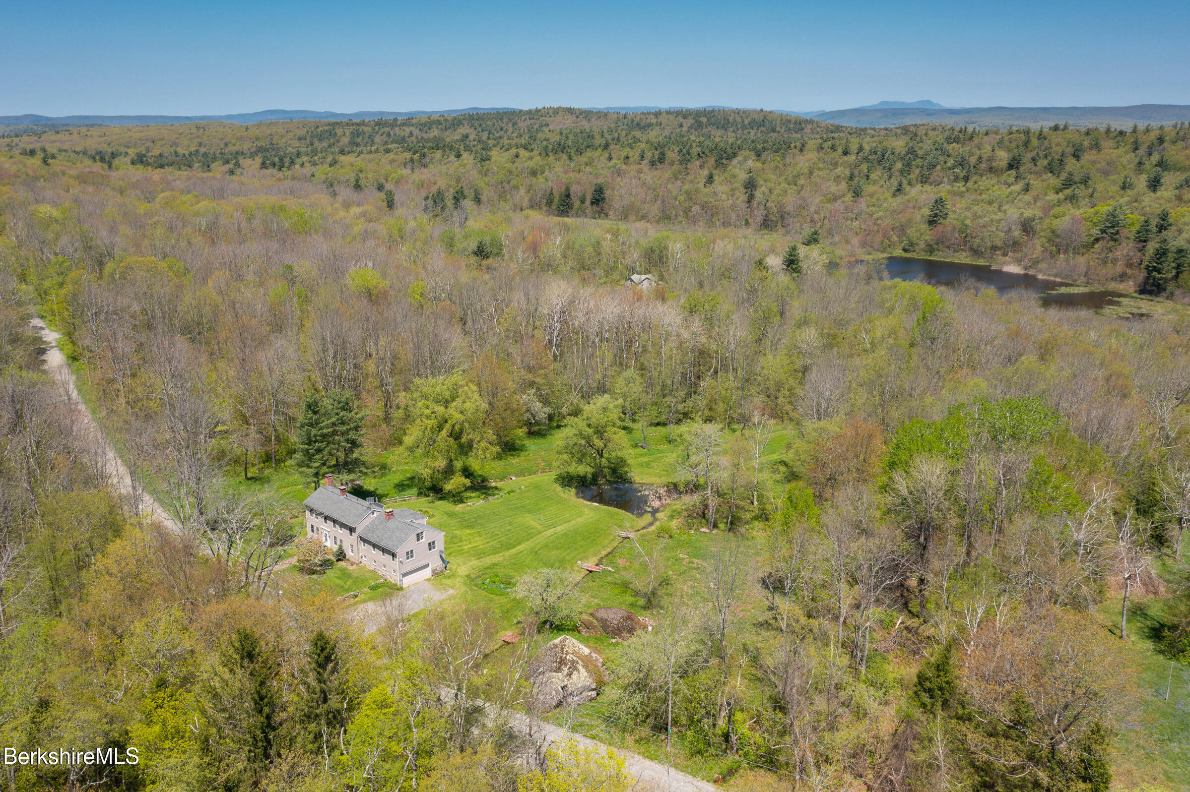 350 Beartown Mountain Road Monterey, MA 01245 - Photo 1 of 38 a view of lake and mountain