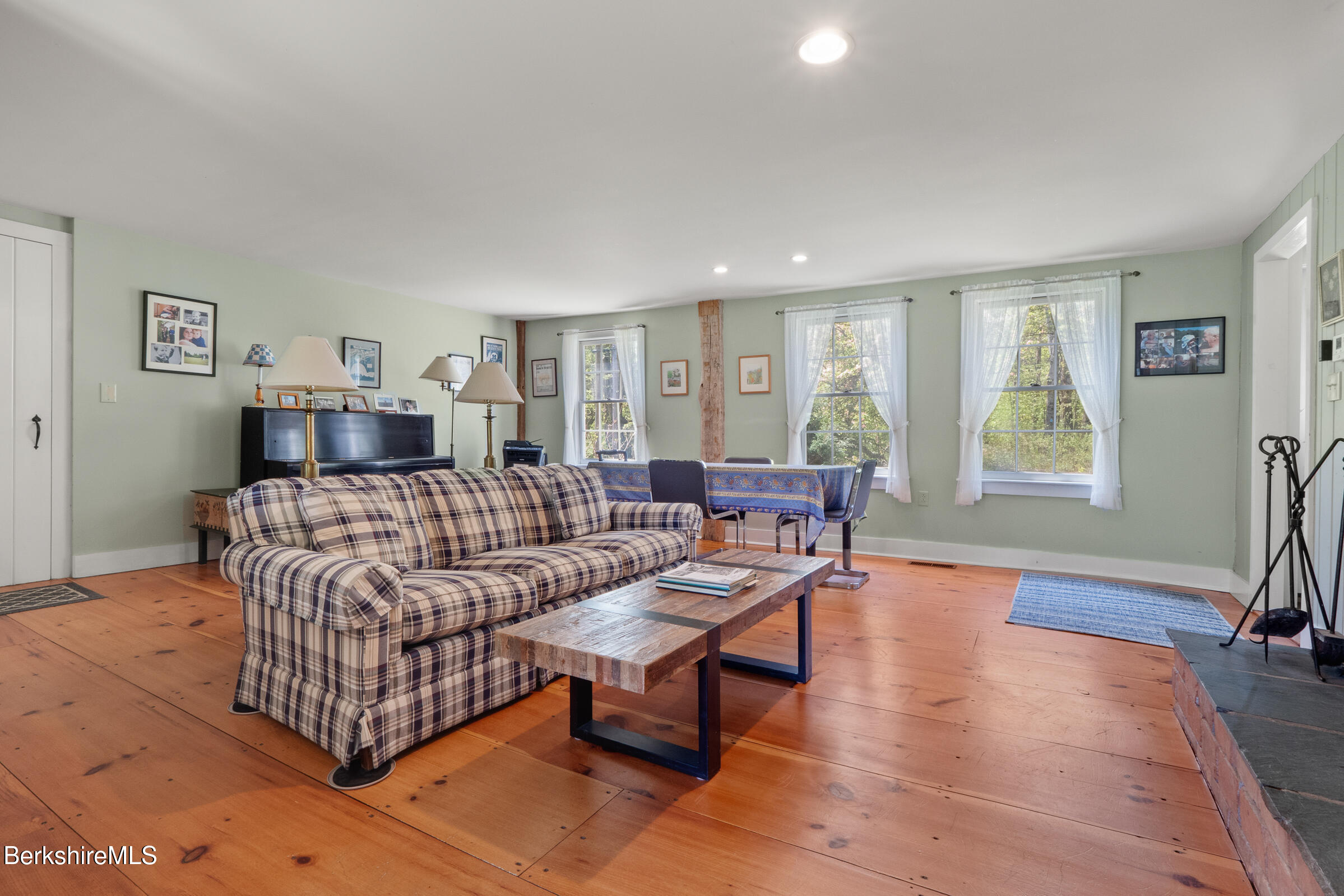 350 Beartown Mountain Road Monterey, MA 01245 - Photo 18 of 38 a living room with furniture and a wooden floor