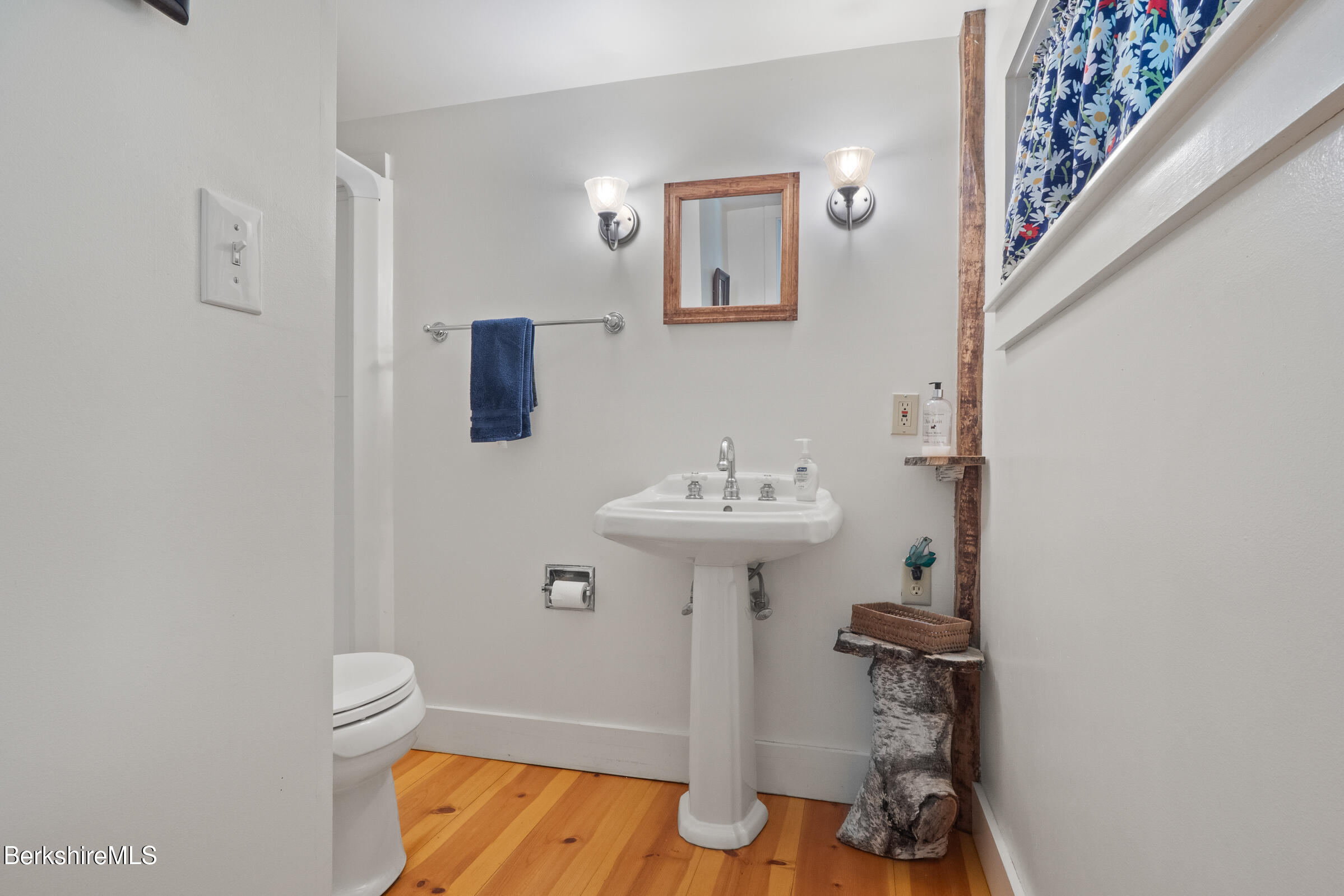 350 Beartown Mountain Road Monterey, MA 01245 - Photo 20 of 38 a bathroom with a sink toilet and mirror