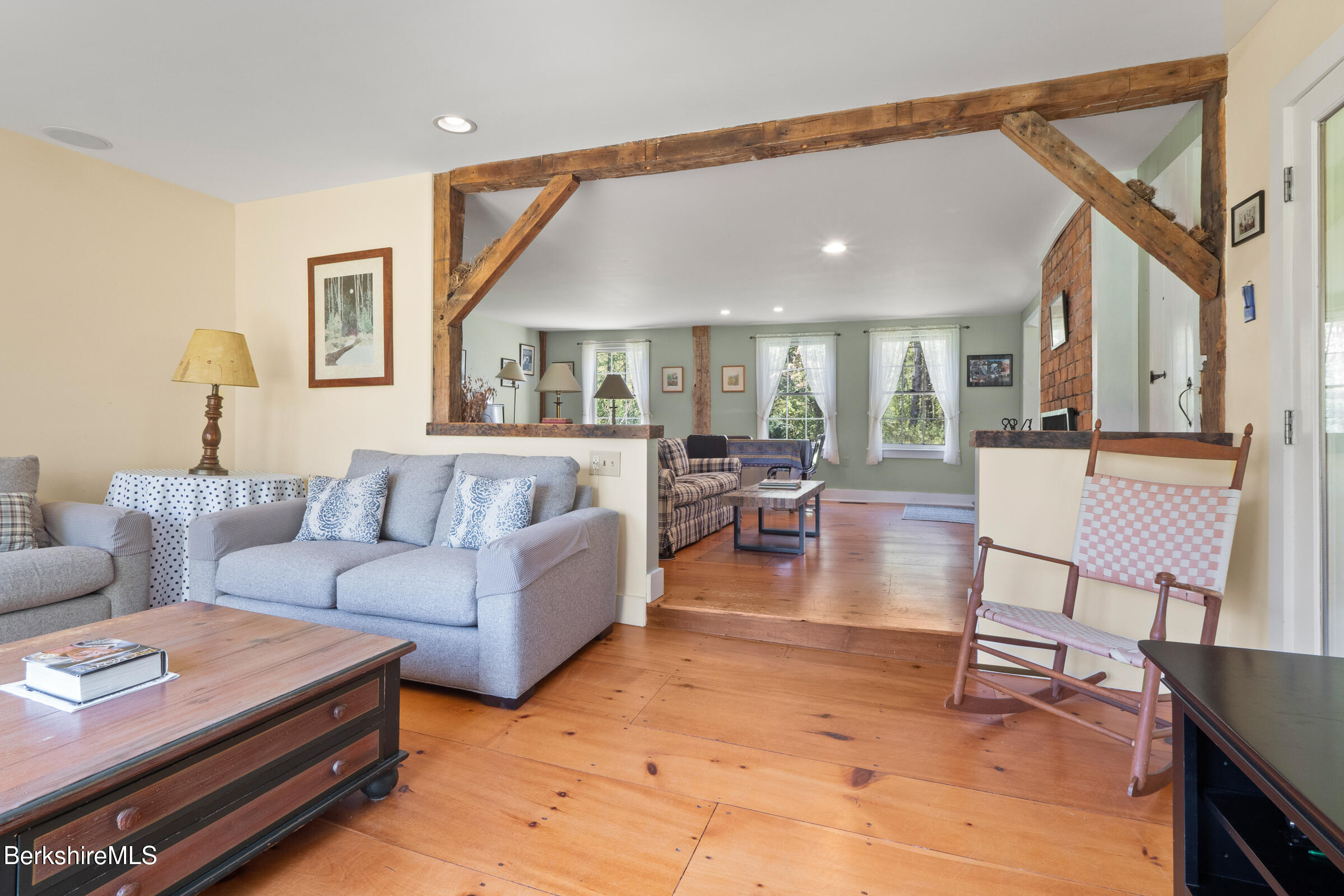 350 Beartown Mountain Road Monterey, MA 01245 - Photo 21 of 38 a living room with furniture a rug and a painting