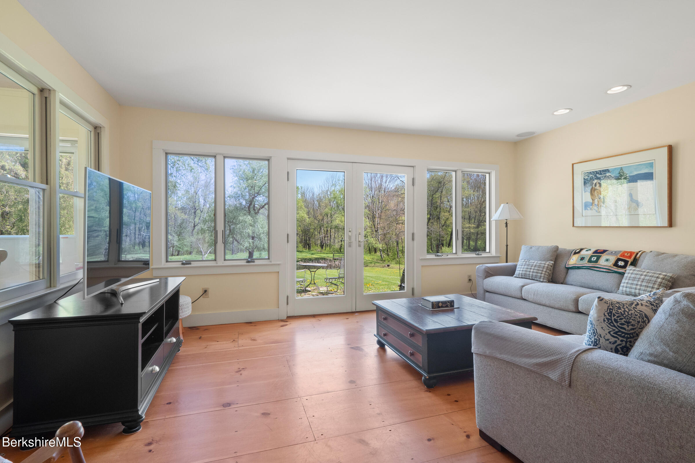 350 Beartown Mountain Road Monterey, MA 01245 - Photo 22 of 38 a living room with furniture and a large window
