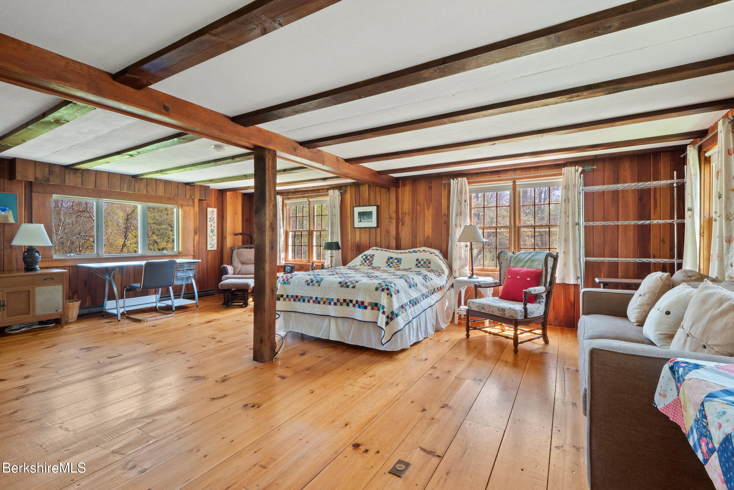 350 Beartown Mountain Road Monterey, MA 01245 - Photo 26 of 38 a bedroom with furniture and a large window