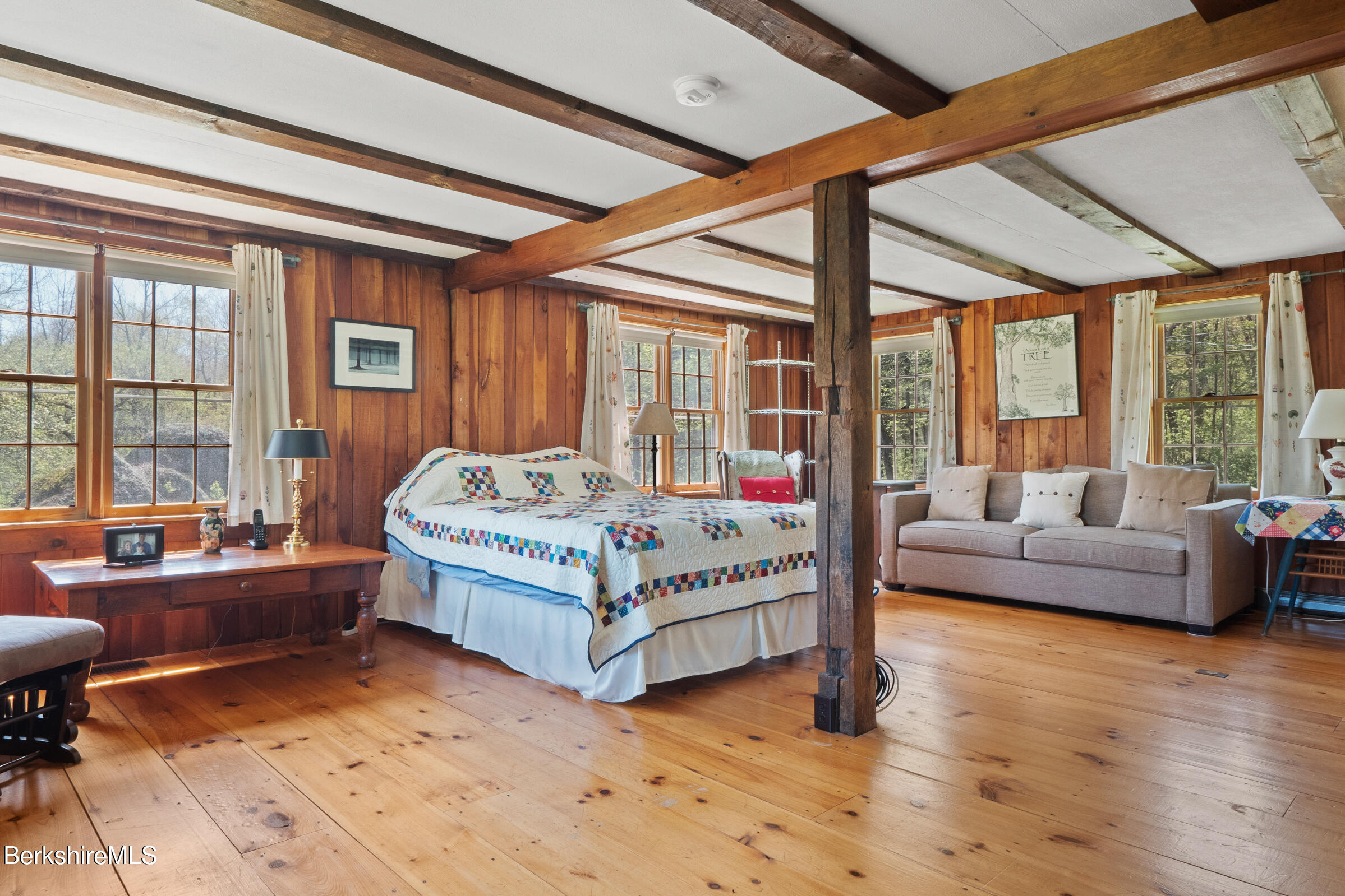 350 Beartown Mountain Road Monterey, MA 01245 - Photo 27 of 38 a bedroom with a bed and glass window