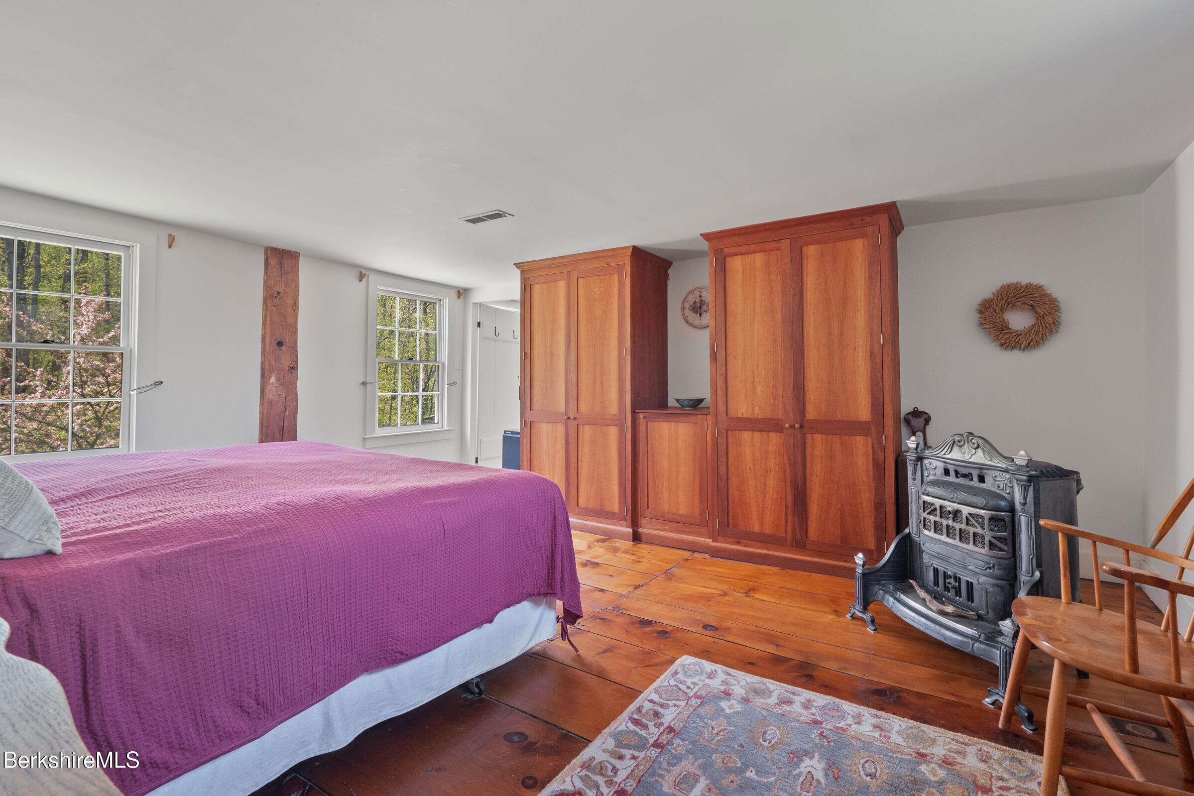 350 Beartown Mountain Road Monterey, MA 01245 - Photo 30 of 38 a bedroom with a bed and a window