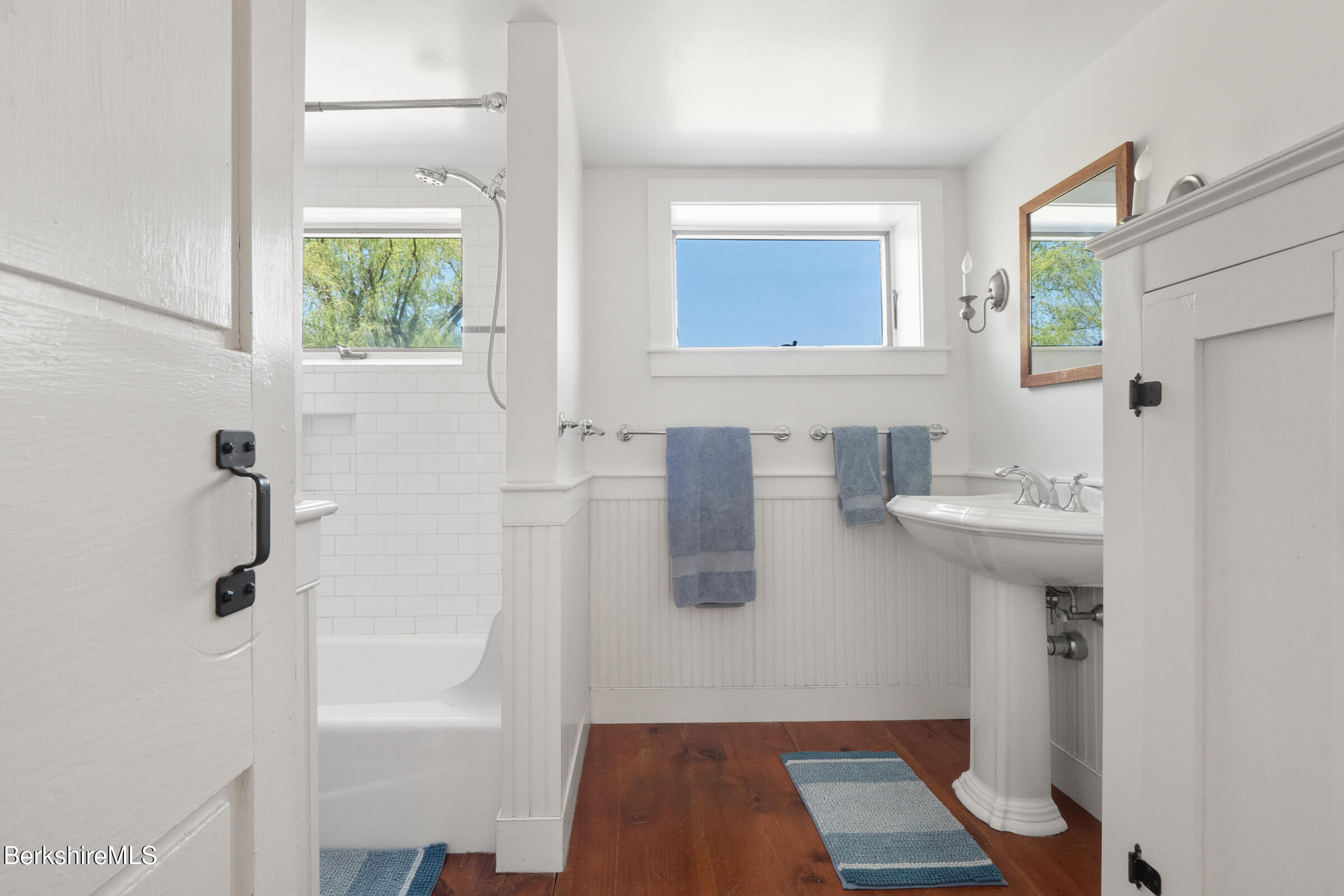 350 Beartown Mountain Road Monterey, MA 01245 - Photo 33 of 38 a bathroom with a sink a mirror and a shower