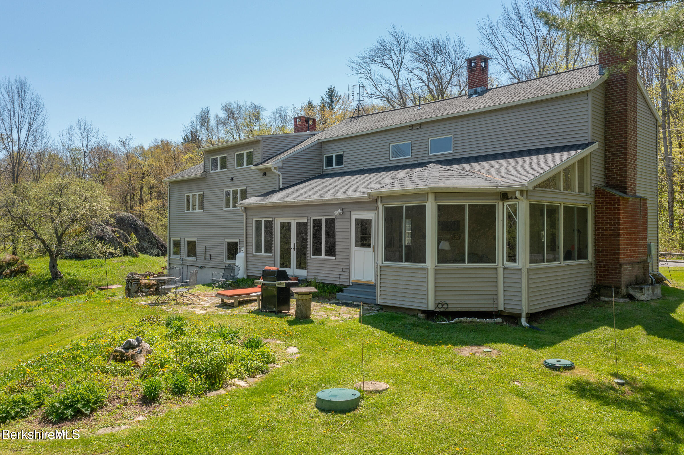 350 Beartown Mountain Road Monterey, MA 01245 - Photo 4 of 38 a view of a house with a yard porch and sitting area