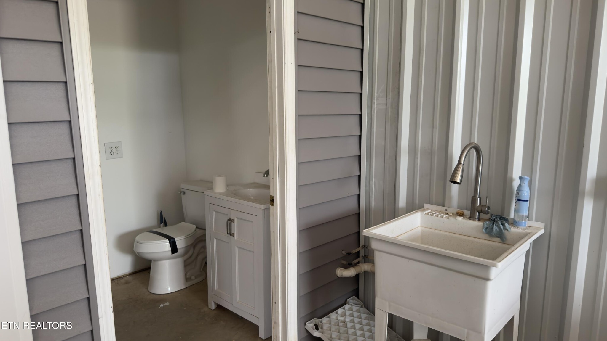2662 Louisville Road Maryville, TN 37801 - Photo 48 of 60 a bathroom with a sink a toilet and shower