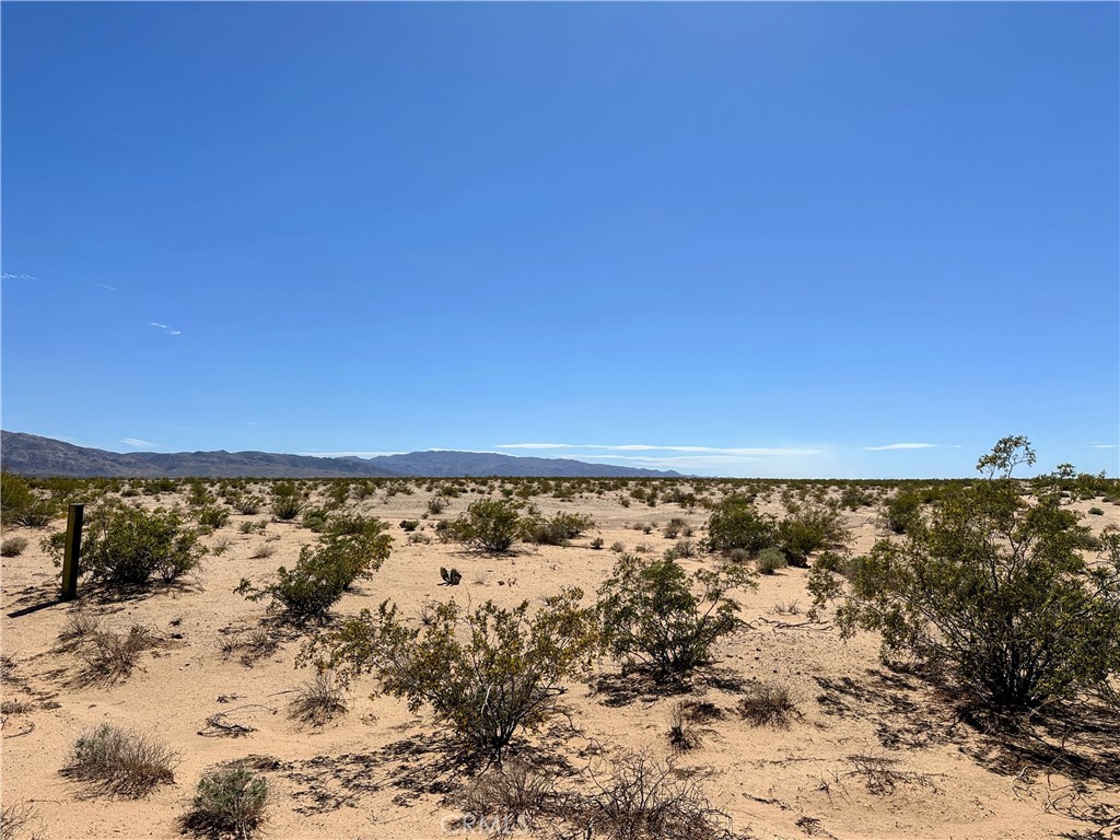 a view of a pathway with a lake view