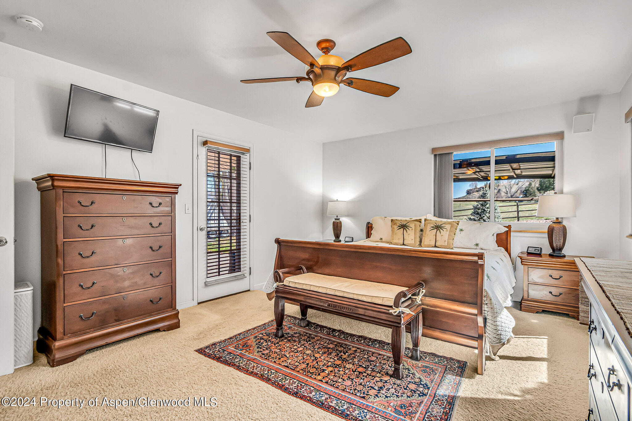 1412 Graham Court Rifle, CO 81650 - Photo 13 of 30 a living room with furniture a rug and a window