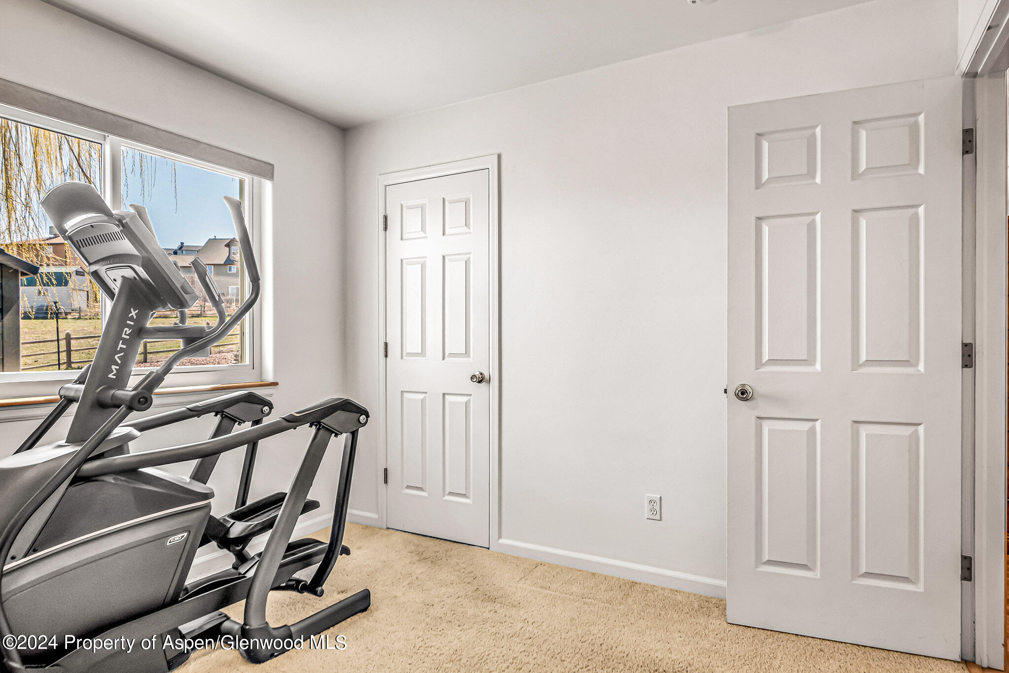 1412 Graham Court Rifle, CO 81650 - Photo 21 of 30 a view of a livingroom with furniture and windows