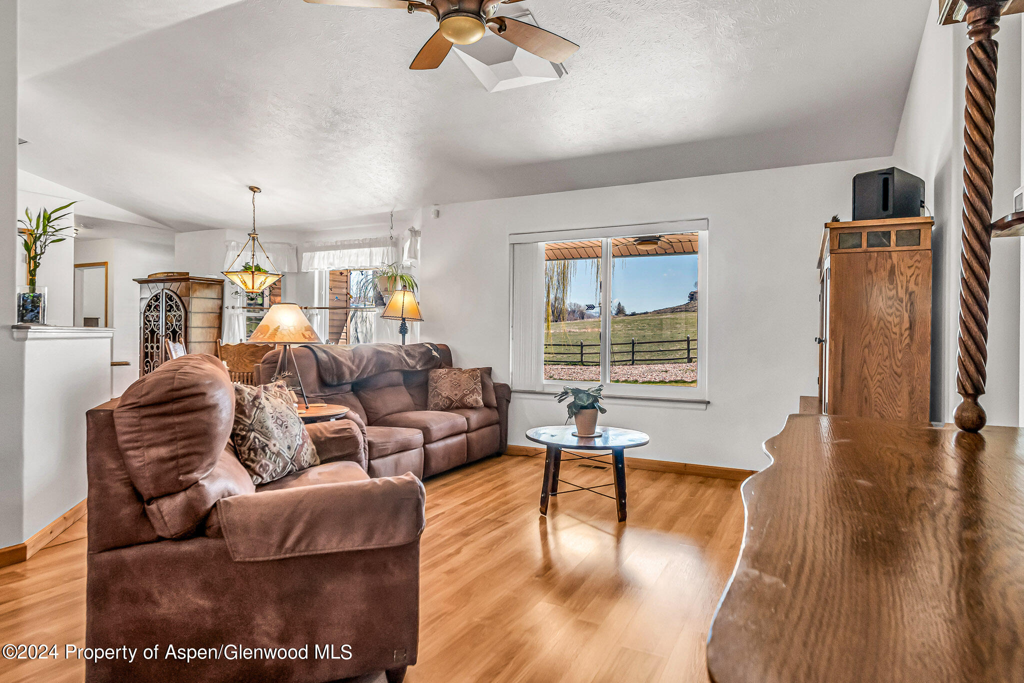 1412 Graham Court Rifle, CO 81650 - Photo 5 of 30 a living room with furniture and a large window