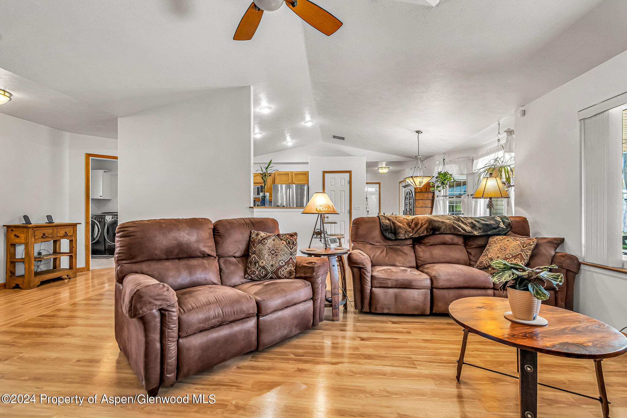 1412 Graham Court Rifle, CO 81650 - Photo 6 of 30 a living room with furniture and a wooden floor
