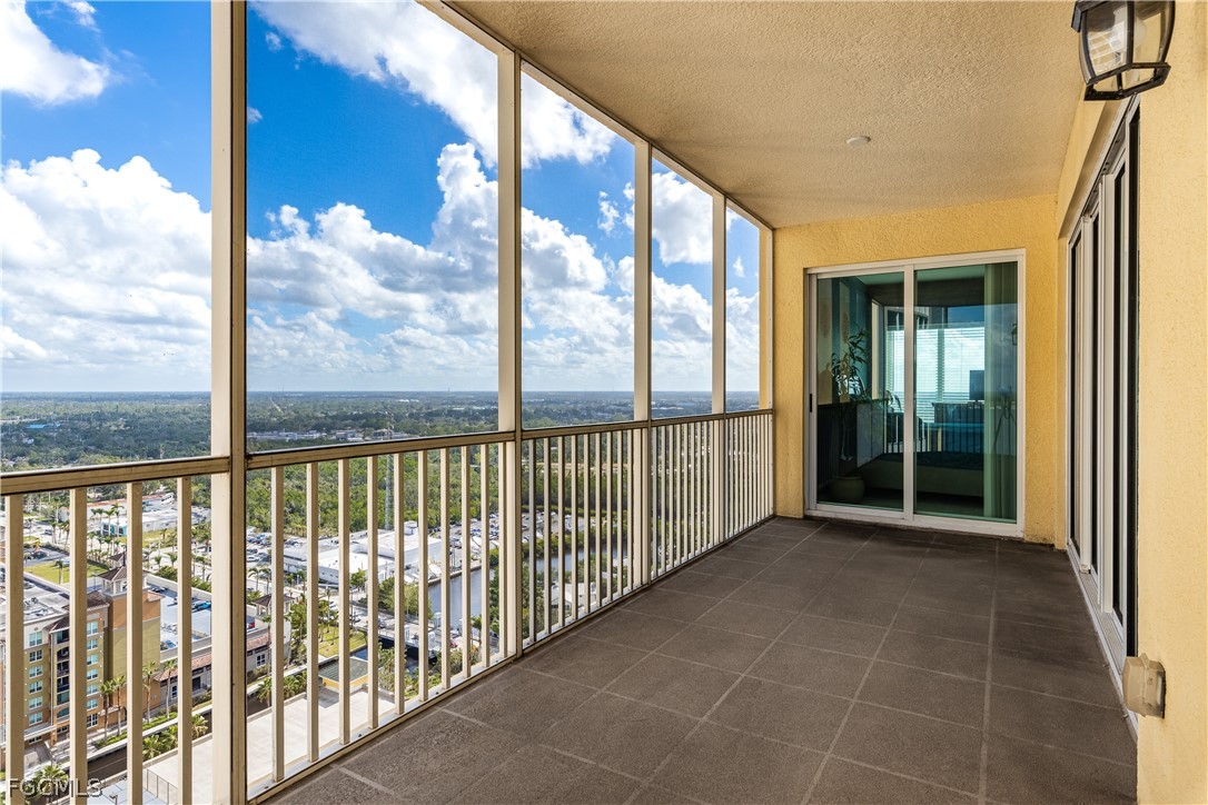 2743 First Street, Unit 2206 Fort Myers, FL 33916 - Photo 16 of 38 a view of a glass door and an outdoor from balcony