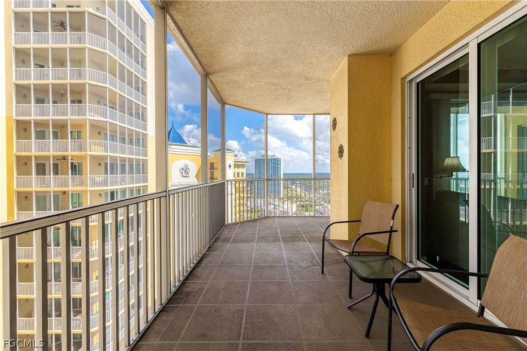 2743 First Street, Unit 2206 Fort Myers, FL 33916 - Photo 17 of 38 a view of balcony with wooden floor