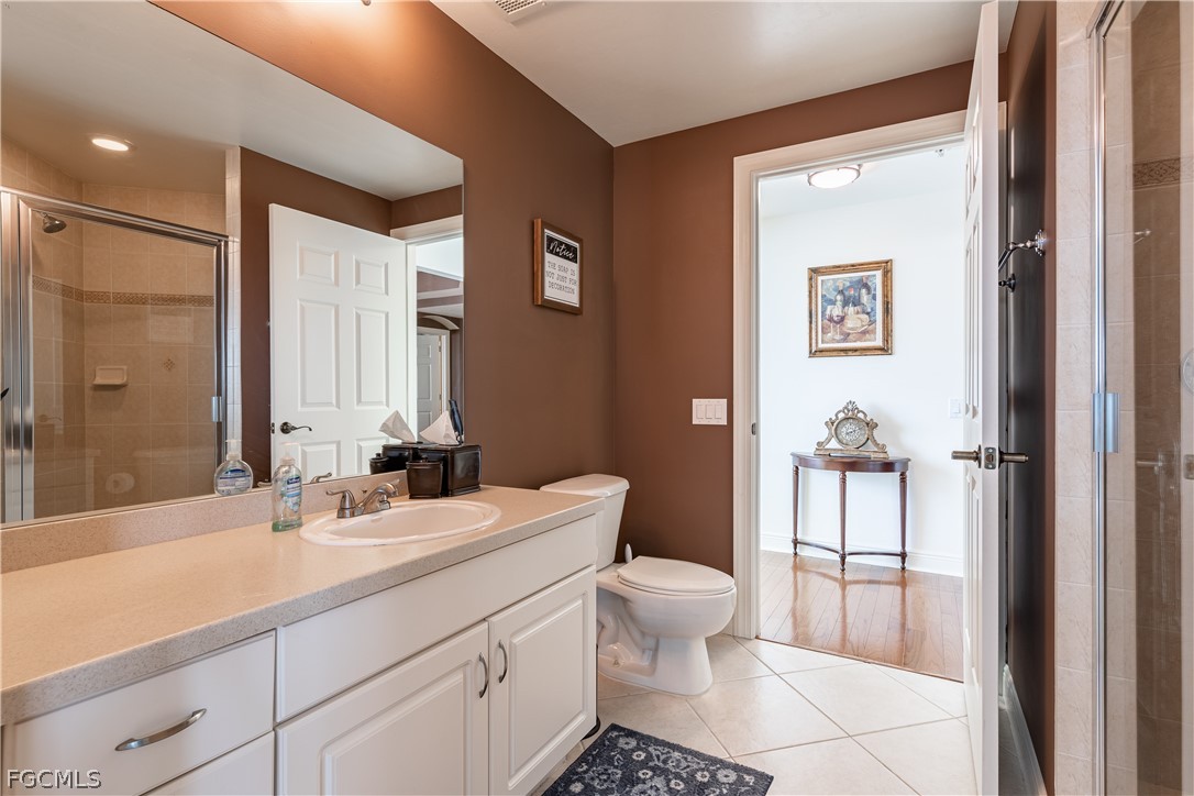 2743 First Street, Unit 2206 Fort Myers, FL 33916 - Photo 27 of 38 a bathroom with a sink toilet and shower