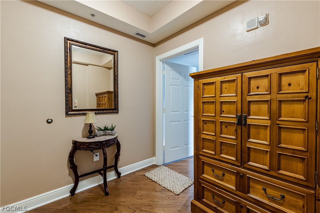 2743 First Street, Unit 2206 Fort Myers, FL 33916 - Photo 3 of 38 a view of an entryway with wooden floor
