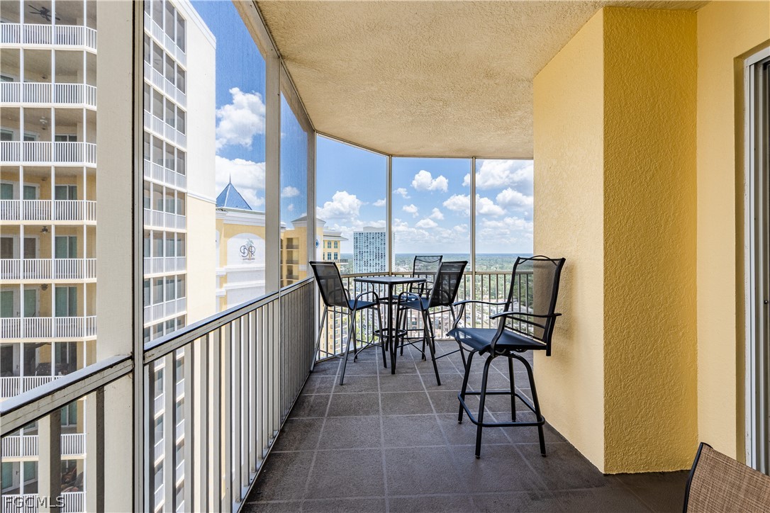 2743 First Street, Unit 2206 Fort Myers, FL 33916 - Photo 36 of 38 a view of a city from a dining room with large windows