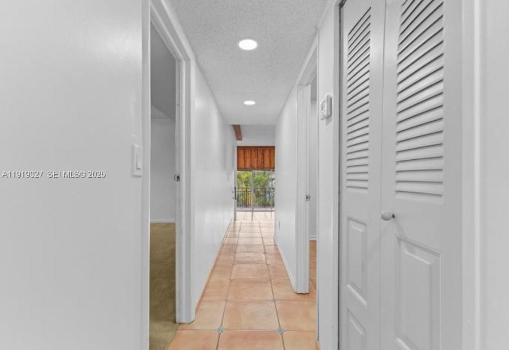 4850 Southwest 63rd Terrace, Unit 232 Davie, FL 33314 - Photo 17 of 28 a view of a hallway
