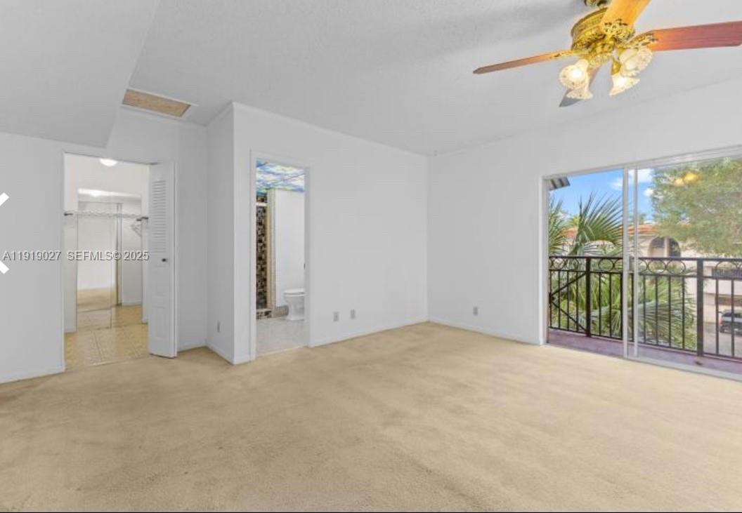 4850 Southwest 63rd Terrace, Unit 232 Davie, FL 33314 - Photo 18 of 28 a view of an empty room with a window