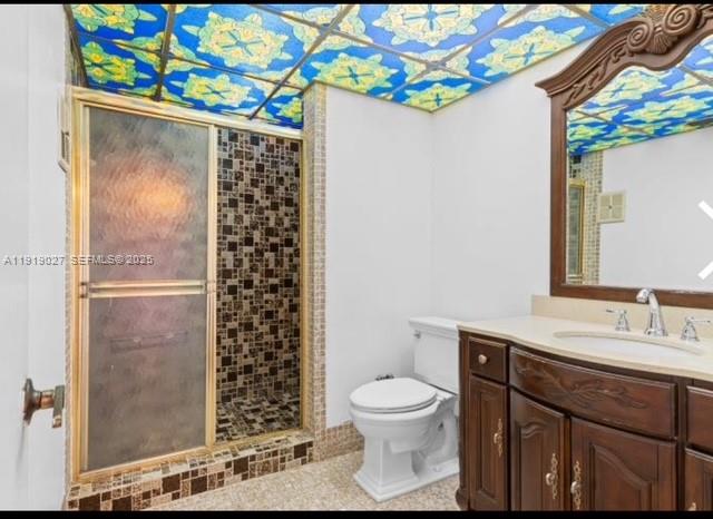 4850 Southwest 63rd Terrace, Unit 232 Davie, FL 33314 - Photo 21 of 28 a bathroom with a sink a toilet and shower