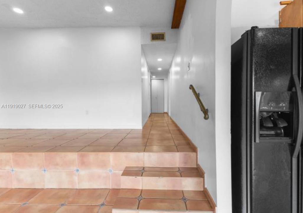 4850 Southwest 63rd Terrace, Unit 232 Davie, FL 33314 - Photo 7 of 28 a view of staircase with white walls