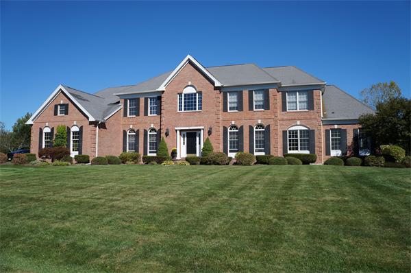 32 Cherokee Road Canton, MA 02021 - Photo 1 of 30 a front view of a house with a yard