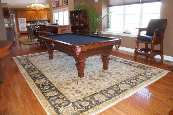 32 Cherokee Road Canton, MA 02021 - Photo 20 of 30 a living room with a rug table and chairs