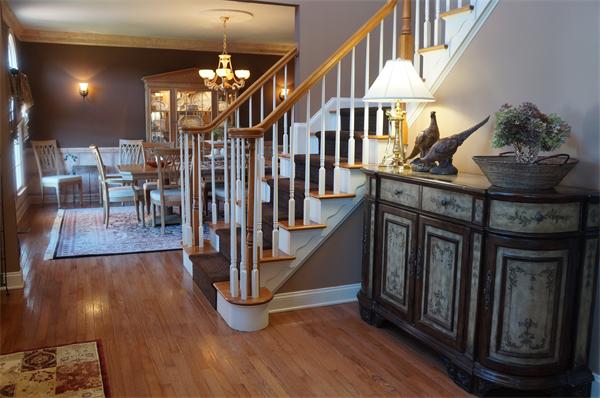 32 Cherokee Road Canton, MA 02021 - Photo 21 of 30 a dining room with furniture entryway and wooden floor