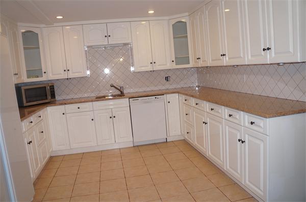 32 Cherokee Road Canton, MA 02021 - Photo 23 of 30 a view of a kitchen with electric appliances