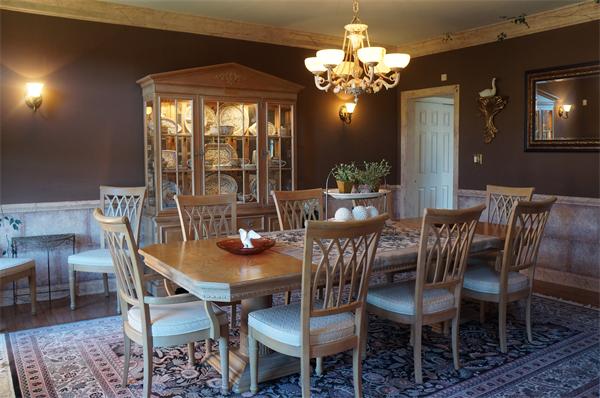 32 Cherokee Road Canton, MA 02021 - Photo 7 of 30 a view of a dining room with furniture wooden floor and chandelier