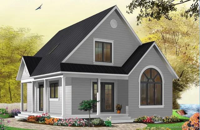 a front view of a house with garden