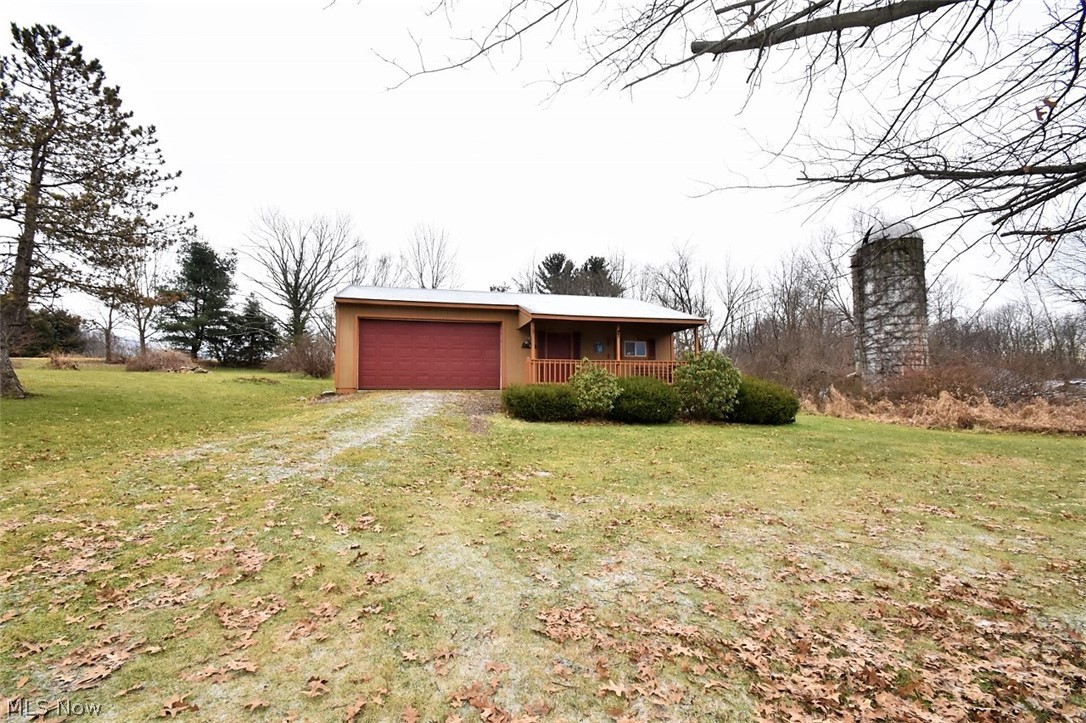 5652 Winchell Road Hiram, OH 44234 - Photo 23 of 25 Outbuilding for additional storage. Includes front porch.