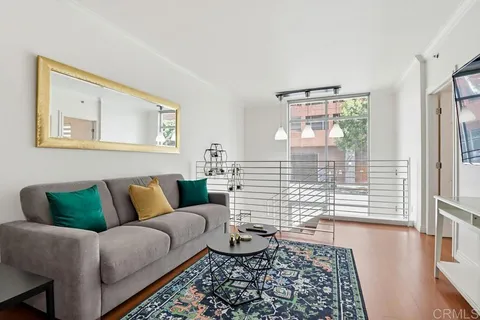 a view of a livingroom with washer and dryer
