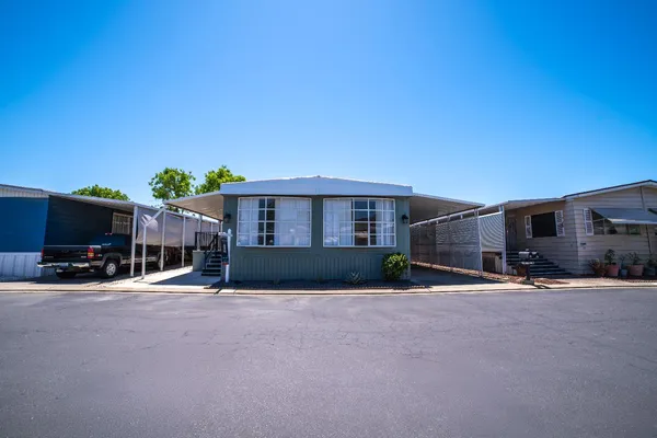 a view of a house with a patio