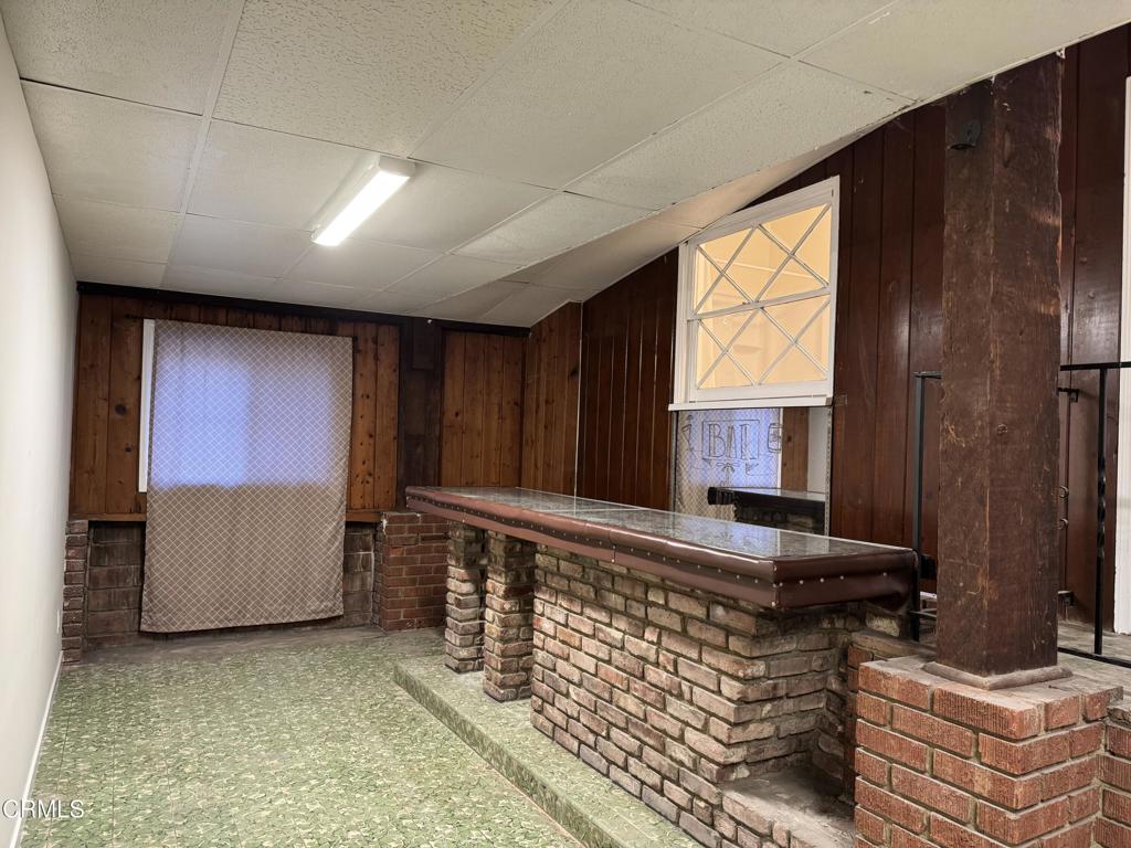 3951 East Cesar E Chavez Avenue Los Angeles, CA 90063 - Photo 9 of 13 a view of kitchen with furniture and a window