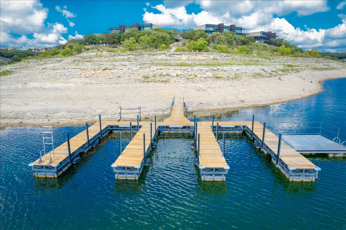 1101 Ivean Pearson Road, Unit A102 Lago Vista, TX 78645 - Photo 28 of 31 Dock area with a water view