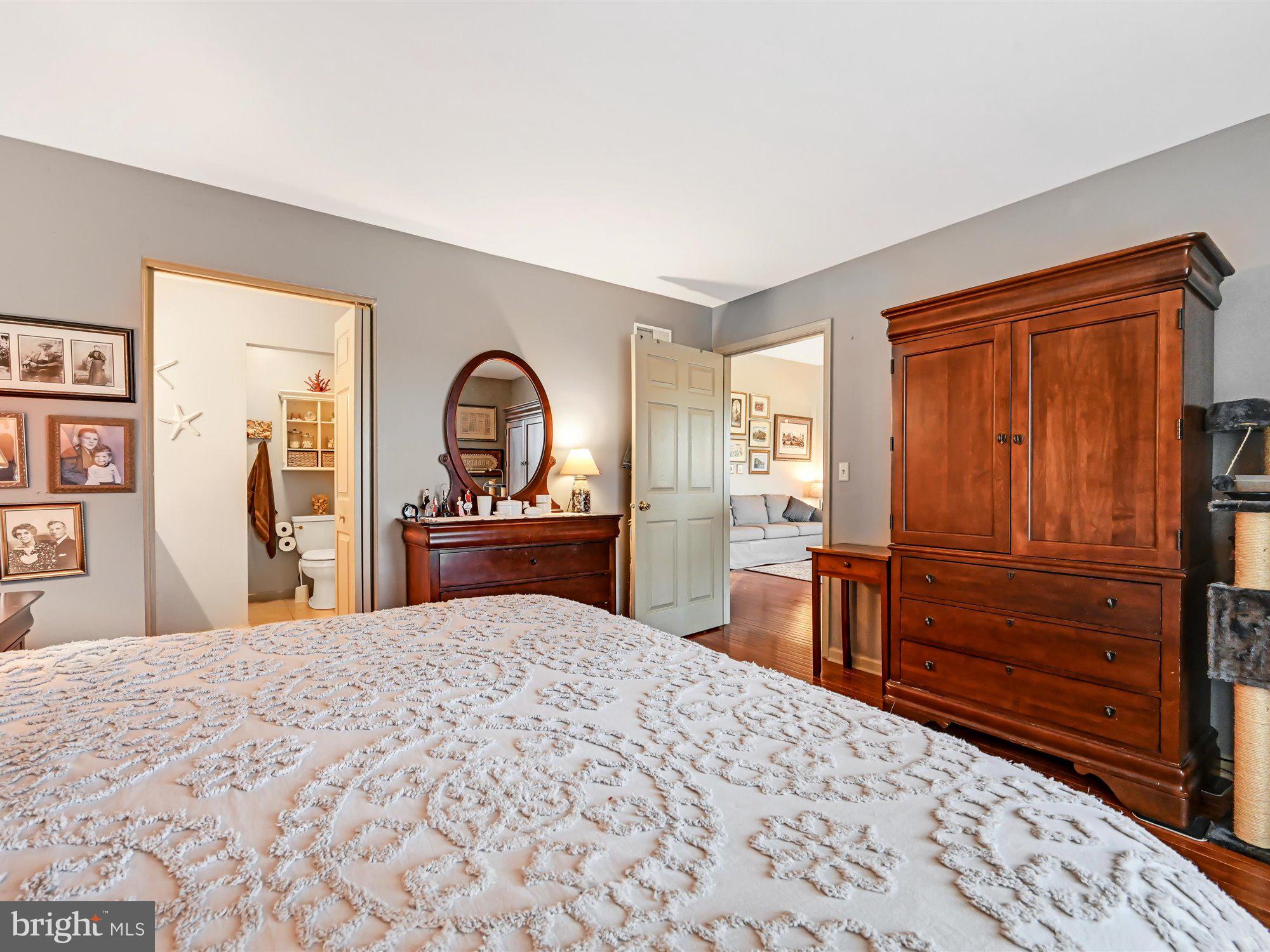 329 North New Street Lititz, PA 17543 - Photo 11 of 20 a large bedroom with a bed and a dresser