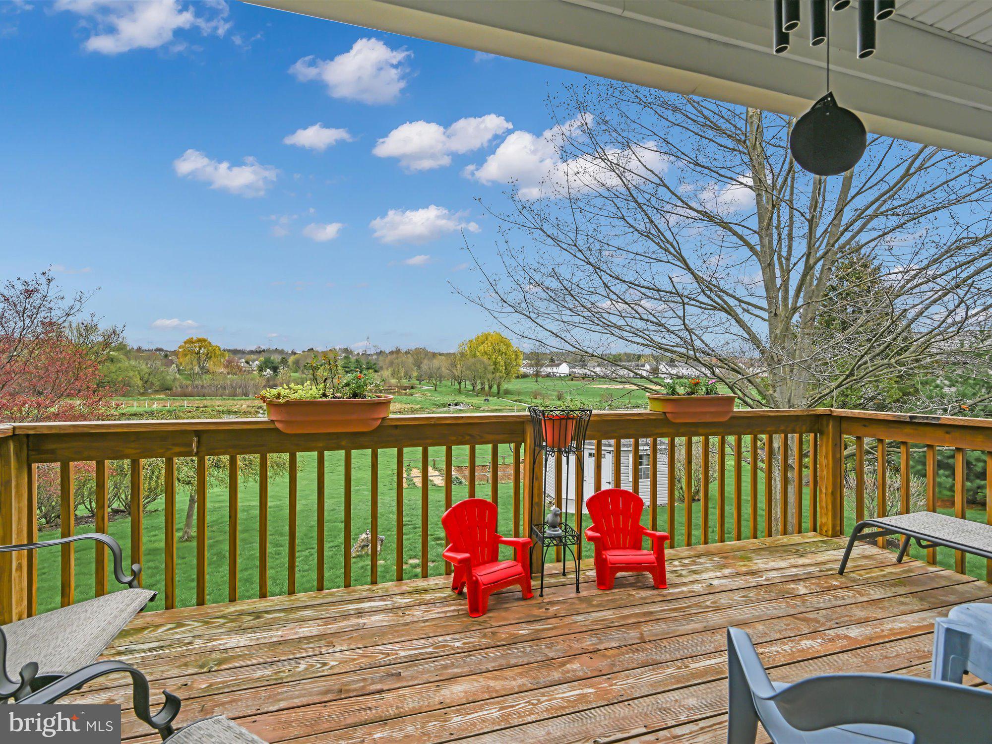 329 North New Street Lititz, PA 17543 - Photo 20 of 20 a wooden bench sitting next to a lake