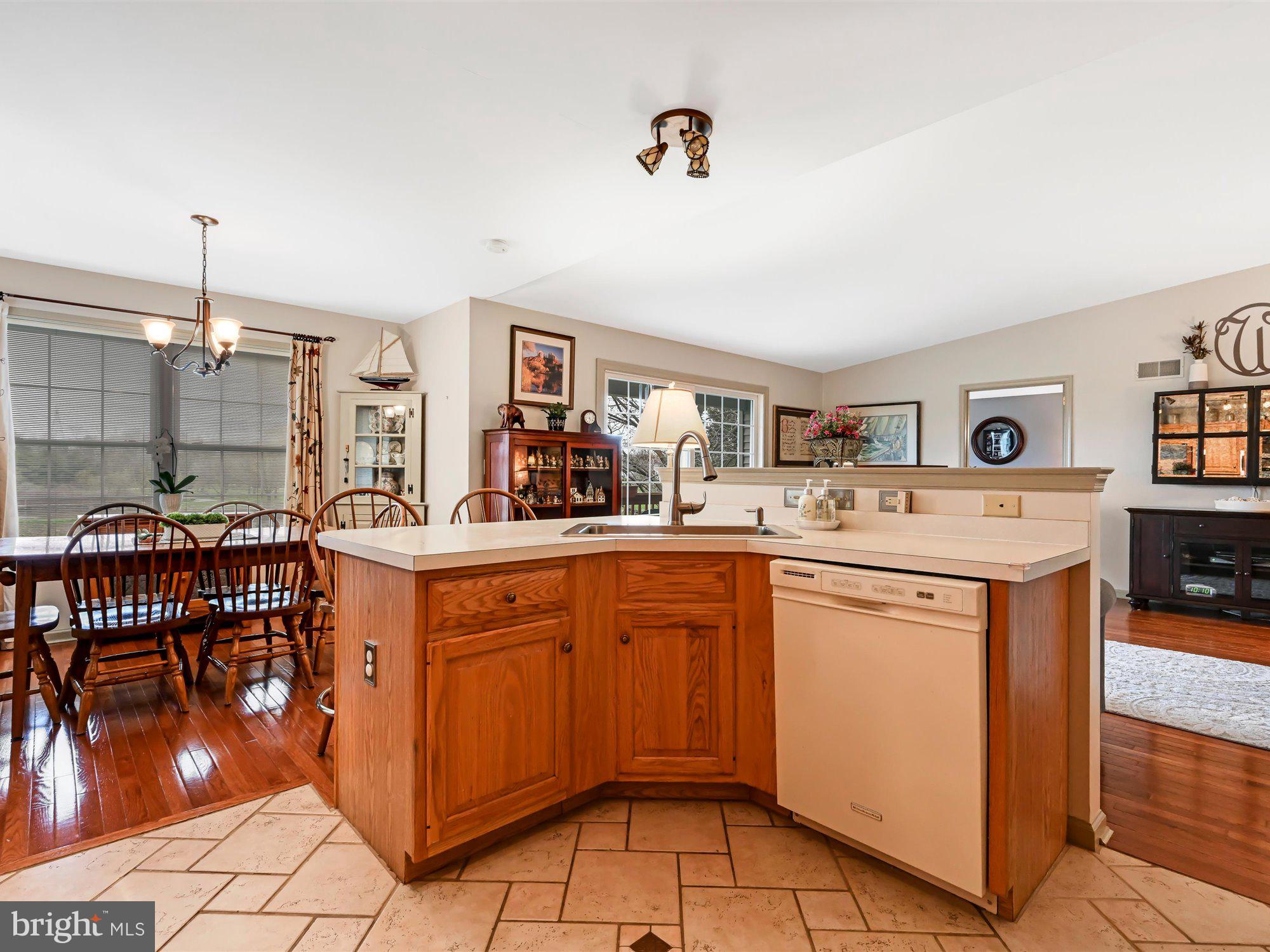 329 North New Street Lititz, PA 17543 - Photo 7 of 20 a kitchen with stainless steel appliances kitchen island granite countertop a sink and cabinets
