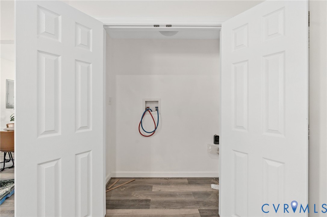 1706 Harvard Road Richmond, VA 23226 - Photo 14 of 27 a bathroom with a glass shower door