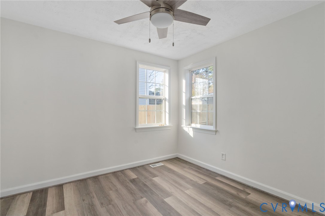 1706 Harvard Road Richmond, VA 23226 - Photo 19 of 27 a view of an empty room with a window