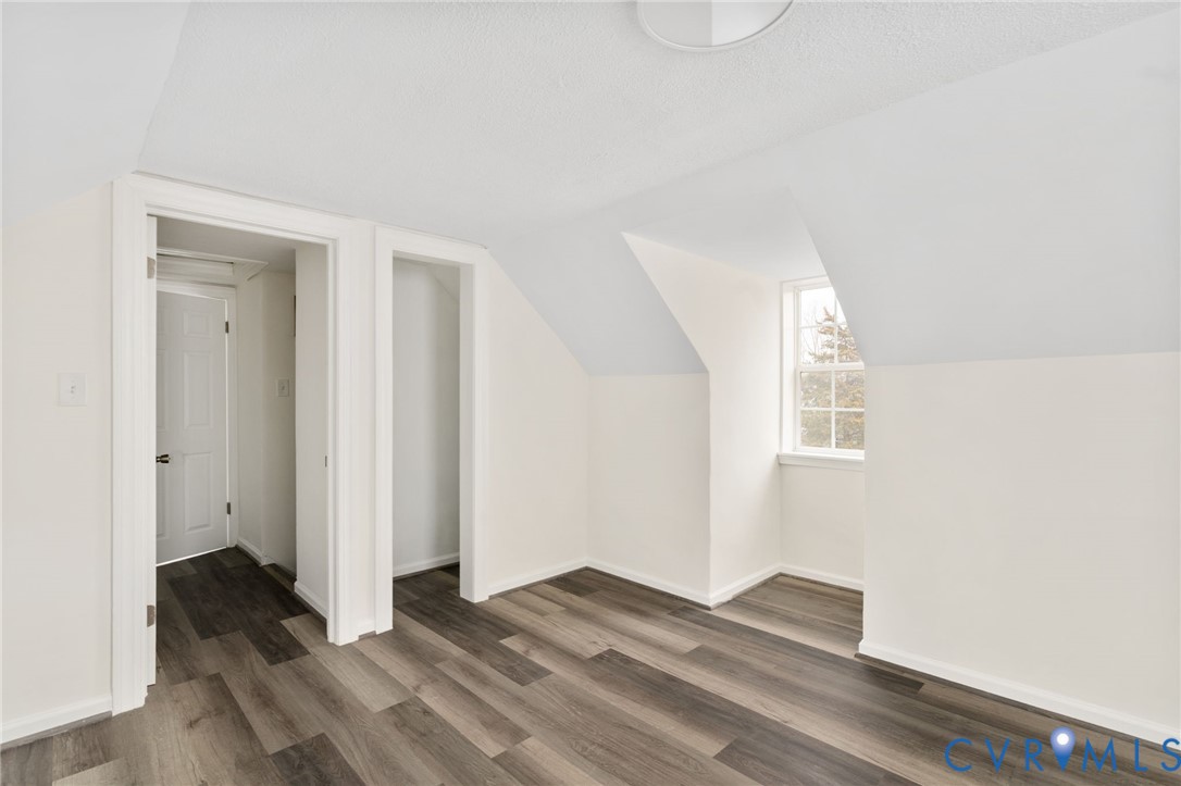 1706 Harvard Road Richmond, VA 23226 - Photo 22 of 27 a view of empty room with wooden floor and fan