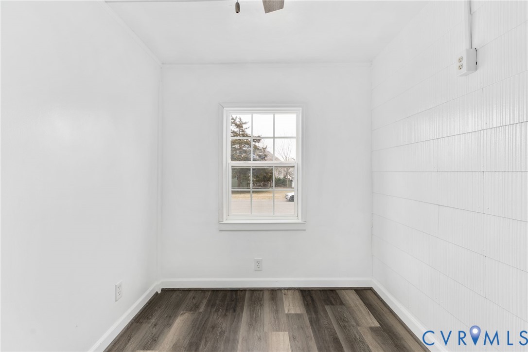 1706 Harvard Road Richmond, VA 23226 - Photo 5 of 27 a view of a small space with wooden floor and a window