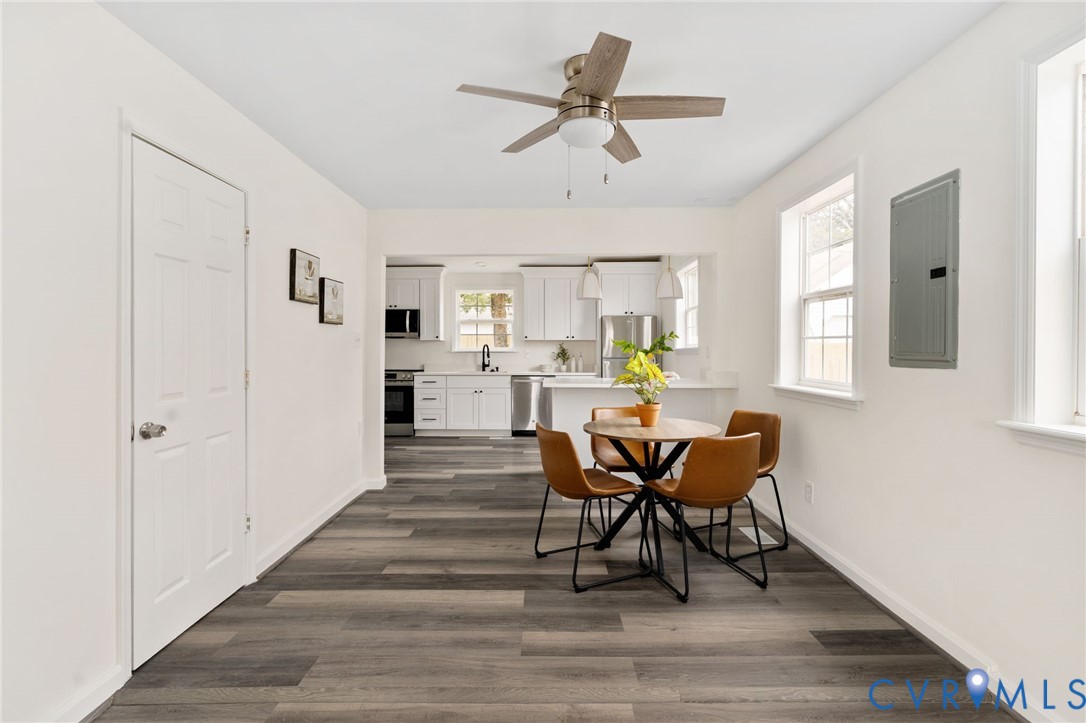 1706 Harvard Road Richmond, VA 23226 - Photo 7 of 27 a view of a dining room with furniture and a window