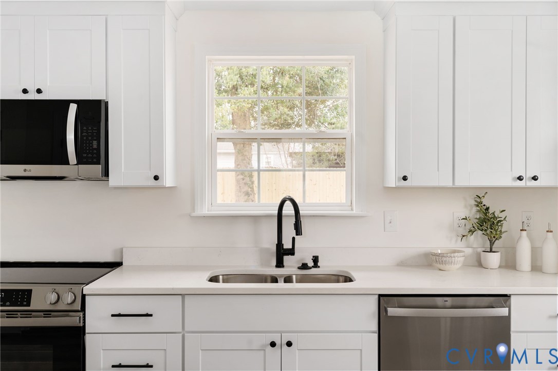 1706 Harvard Road Richmond, VA 23226 - Photo 9 of 27 a kitchen with a sink and cabinets