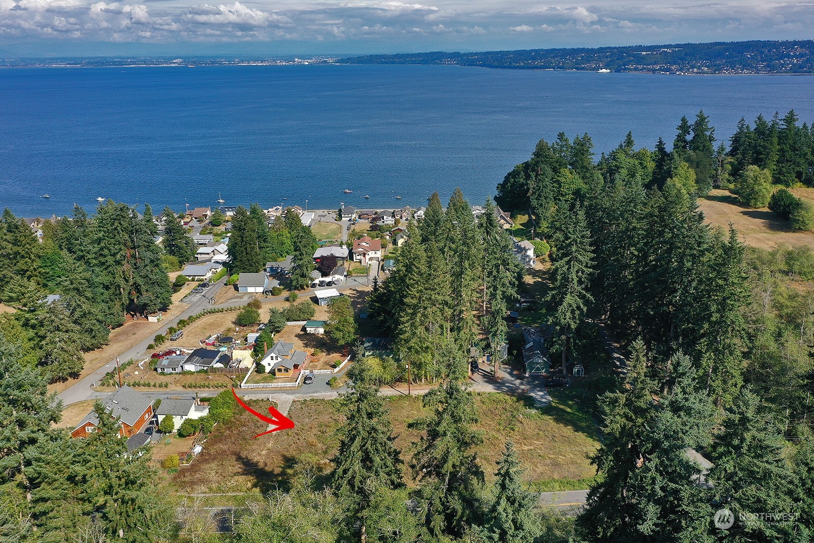 6880 Helena Street Clinton, WA 98236 - Photo 6 of 14 a view of a lake with a mountain view