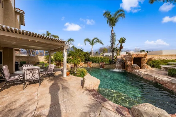 a view of a backyard with a patio
