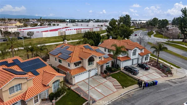 an aerial view of residential houses and city street