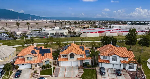 an aerial view of a house with swimming pool