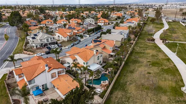 an aerial view of a house with a ocean view